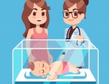 pediatrician-doctor-mother-with-little-newborn-baby-inside-incubator-box-hospital_53562-9014